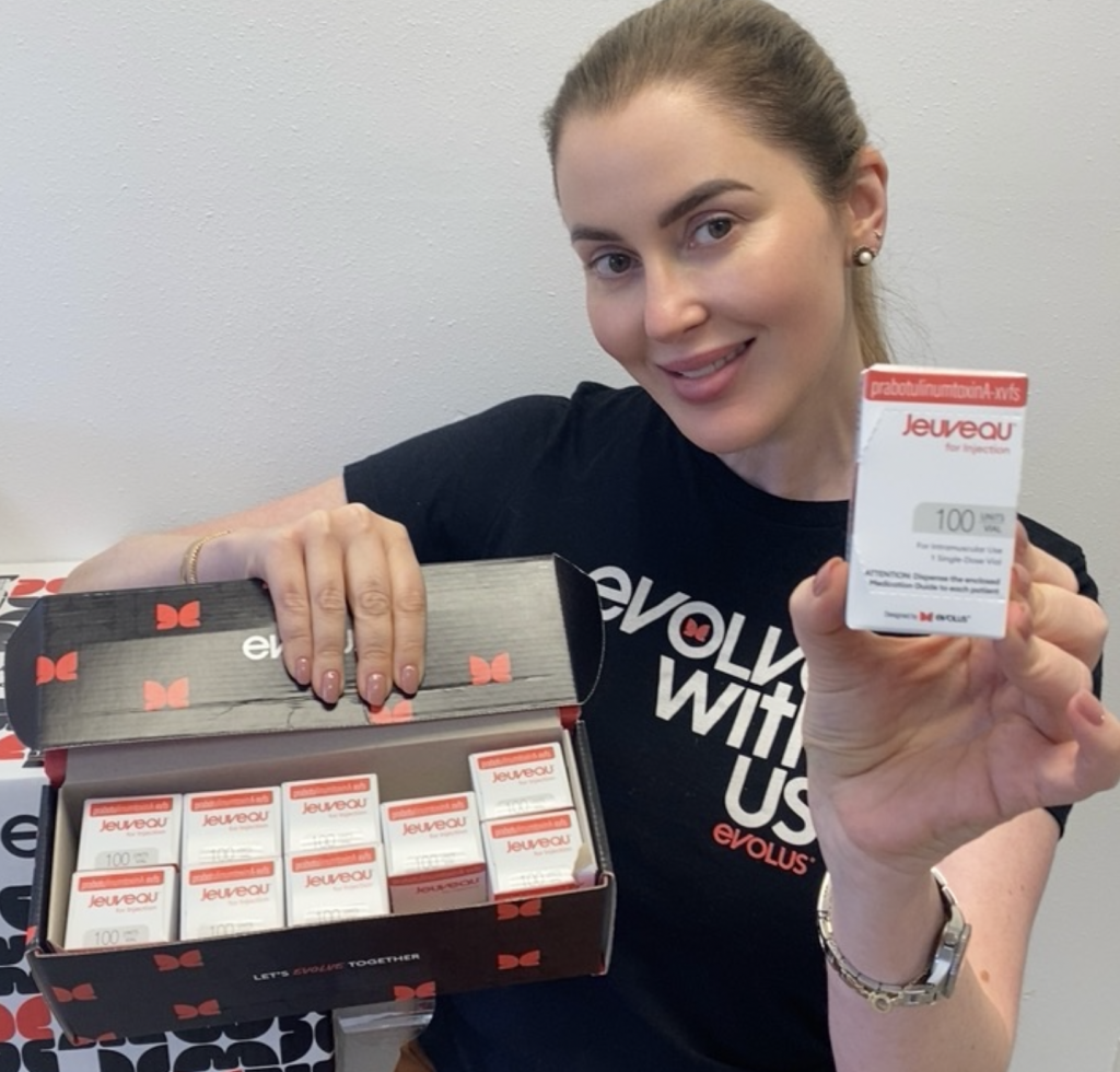 Hula Castellon, Founder, FNP, MSN holding a box of Jeuveau.